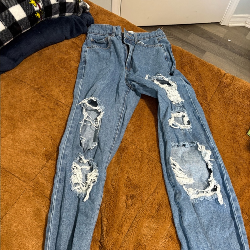Distressed Blue Denim Jeans